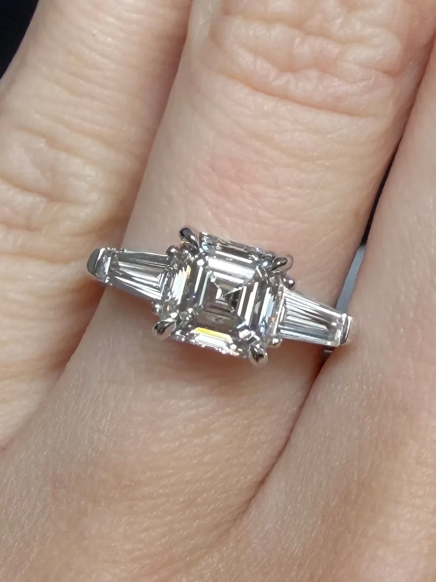 Asscher cut lab diamond engagement ring with tapered baguette side stones in platinum, designed by A. D'Mae Diamonds