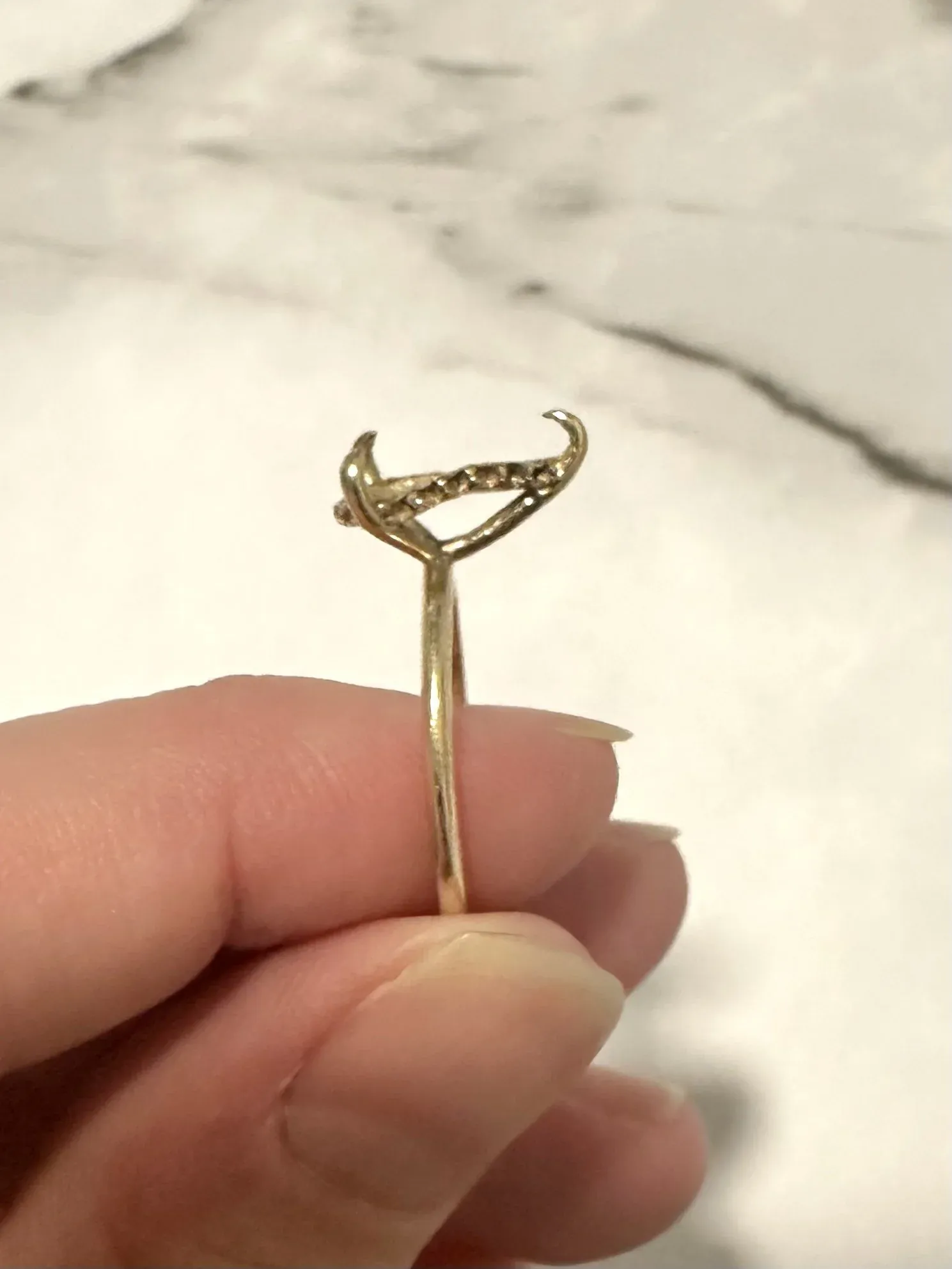 Damaged whisper-thin 1.5mm engagement ring band showing structural failure and missing center stone, A. D'Mae Diamonds Los Angeles